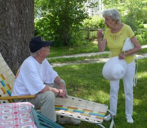 Ed Steinberg, President of the South Jersey Chapter of the Veterans of the Battle of The Bulge, speaking with Arlene deMonceau Michaelis, who grow up in Belgium and lived through the German occupation