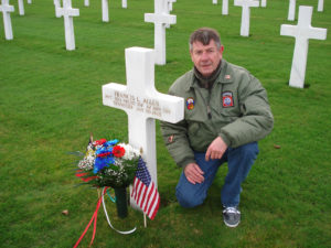 Bruno Pollet of Belgium, at the grave of Francis L. Allen, 82nd Airborne, 504th PIR that he adopted.