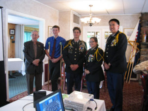 (l-r) Eliot Hermon, president Chapter #59, Cadet Sgt. 1st Class Thomas Sheboy (on crutches), Cadet Lt. Col. Valentin Olingheru, Cadet Command Sgt. Major Corey Lisa,