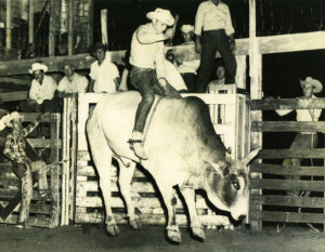 Kenneth “Cowboy” Morris at a rodeo in Paris, Texas, 1953.